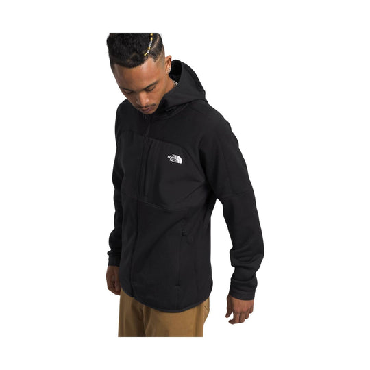 Black zip-up hooded jacket with a small chest logo, shown on a model