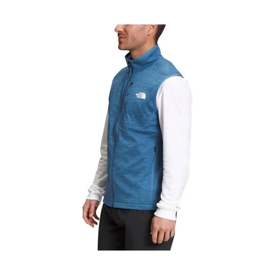 Blue heather zip-up fleece vest with white long sleeves and a small chest logo