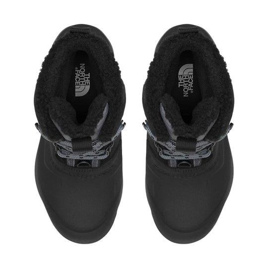 Black insulated winter boots with gray laces and fur-lined openings, top view