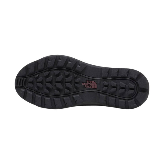 Black lugged boot outsole with The North Face logo.