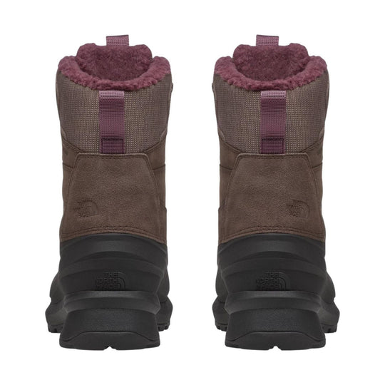 Pair of brown insulated winter boots with burgundy fleece lining, rear pull tabs, and black rubber soles