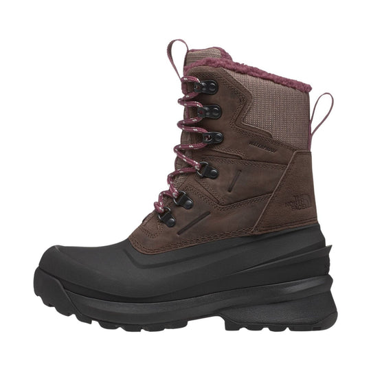 Brown and black insulated winter boot with lace-up front and waterproof marking