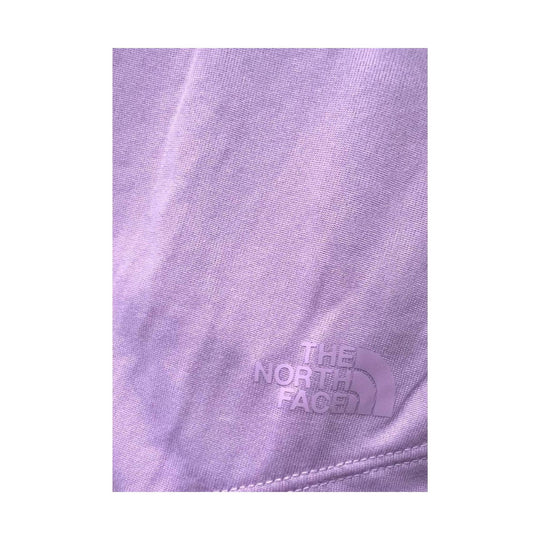 Lavender knit shirt with The North Face logo near the hem