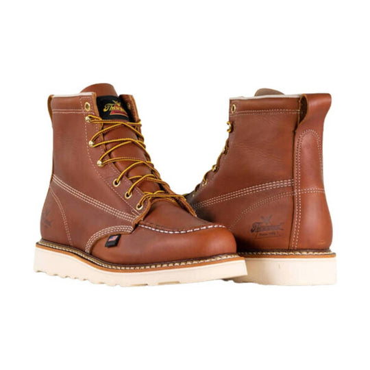 Brown lace-up work boots with white soles, shown in front and back views