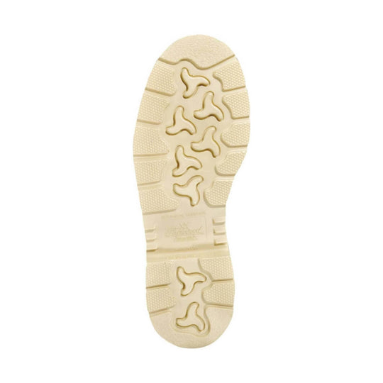 Beige boot outsole with lug tread and embossed logo near the heel