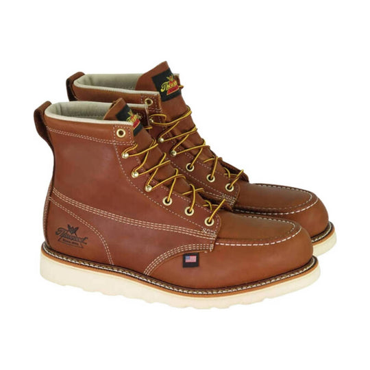 Brown leather lace-up work boots with cream soles, shown in side view.