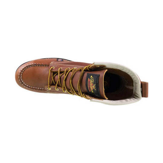 Brown leather moc-toe work boot with yellow laces, cream padded collar, and visible tongue logo