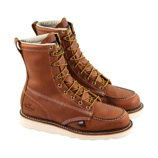 Brown leather lace-up work boots with moc toes and cream soles