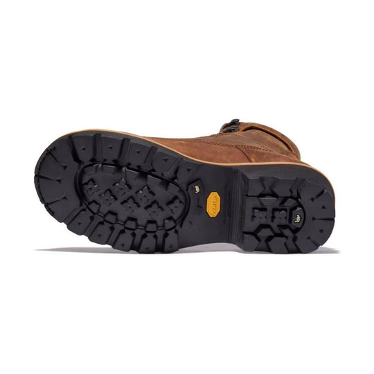 Brown leather work boot shown from the outsole, with a heavy black lug sole