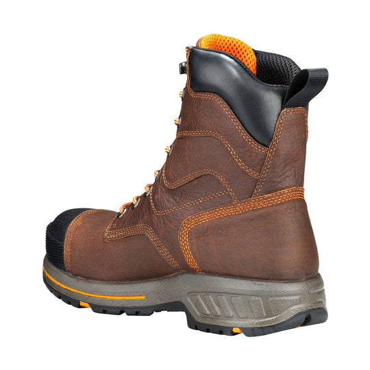 Brown leather work boot with black padded collar, orange lining, and gray rubber sole, shown in side view