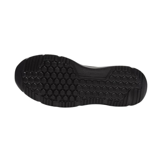 Black work shoe outsole with hexagonal tread pattern