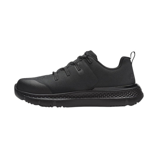 Black low-top work shoe with lace-up front and thick treaded sole