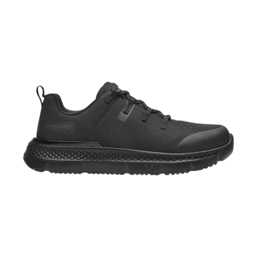 Black low-top work shoe with a thick treaded sole, lace-up closure, and heel pull tab