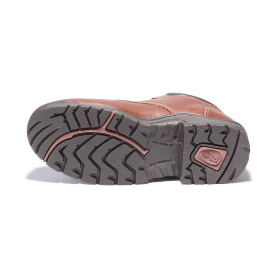 Brown leather work shoe shown from the outsole with deep tread and visible slip-resistant markings