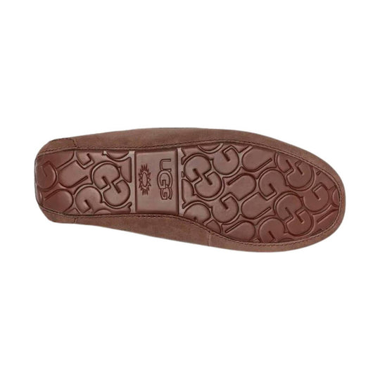 Brown suede moccasin slipper sole with embossed UGG logo