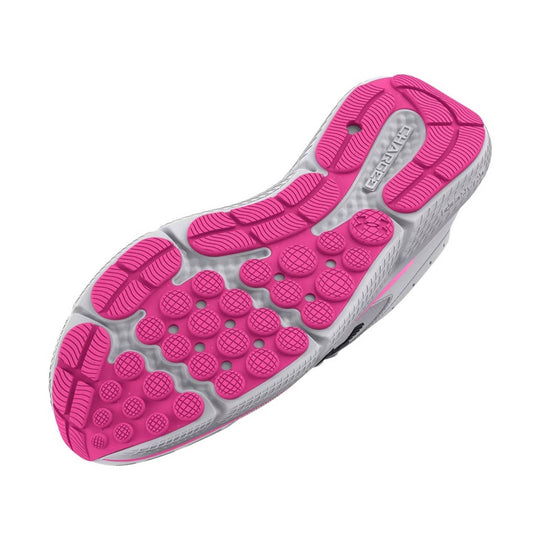 Pink and gray athletic shoe outsole with textured traction pods and visible CHARGED branding