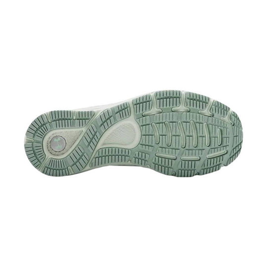 Mint green sneaker outsole with segmented rubber tread and oval traction zones