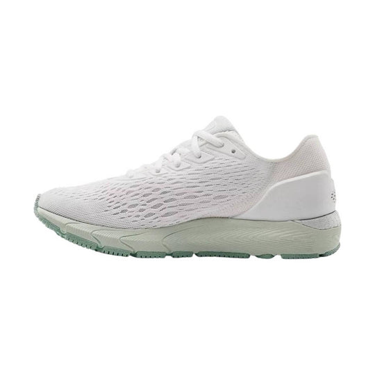 White knit running shoe with pale green sole, shown in side profile