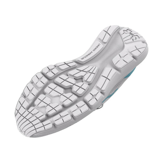 White sneaker outsole with segmented tread and Under Armour branding