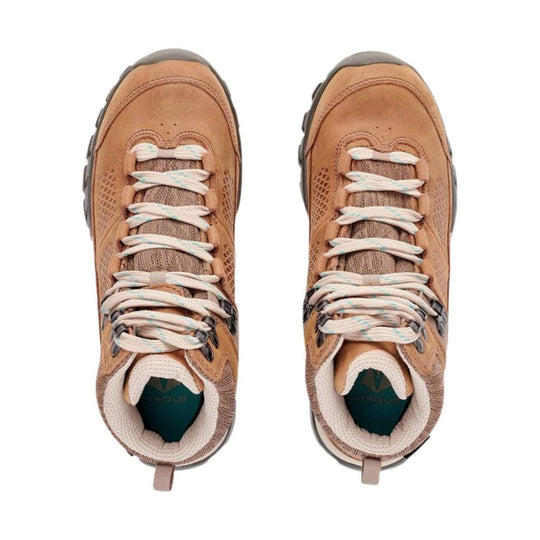 Tan waterproof hiking boots with cream laces, mesh panels, and black lug soles, shown top down