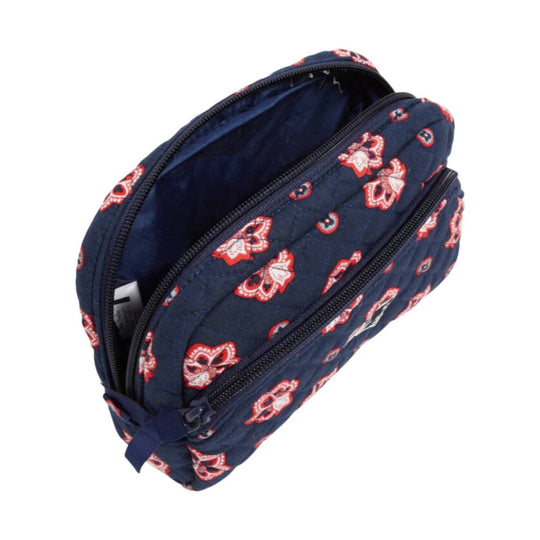 Navy quilted zip cosmetic pouch with red floral print