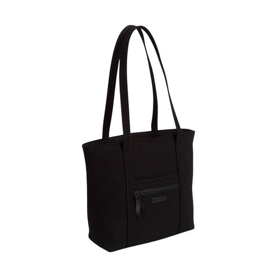 Black quilted tote bag with long shoulder straps and a front zip pocket