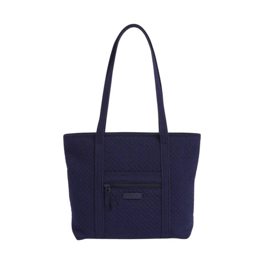Dark navy quilted tote bag with long shoulder straps and a small front zip pocket