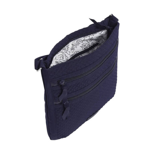 Navy quilted crossbody bag with three zippered front pockets