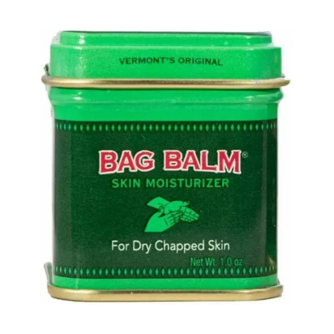 Green metal tin of skin moisturizer with a gold rim and red-and-white label