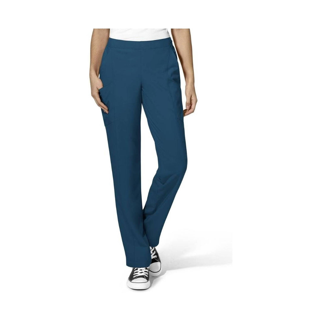 Blue straight-leg scrub pants with front pockets and drawstring waist, shown with black sneakers