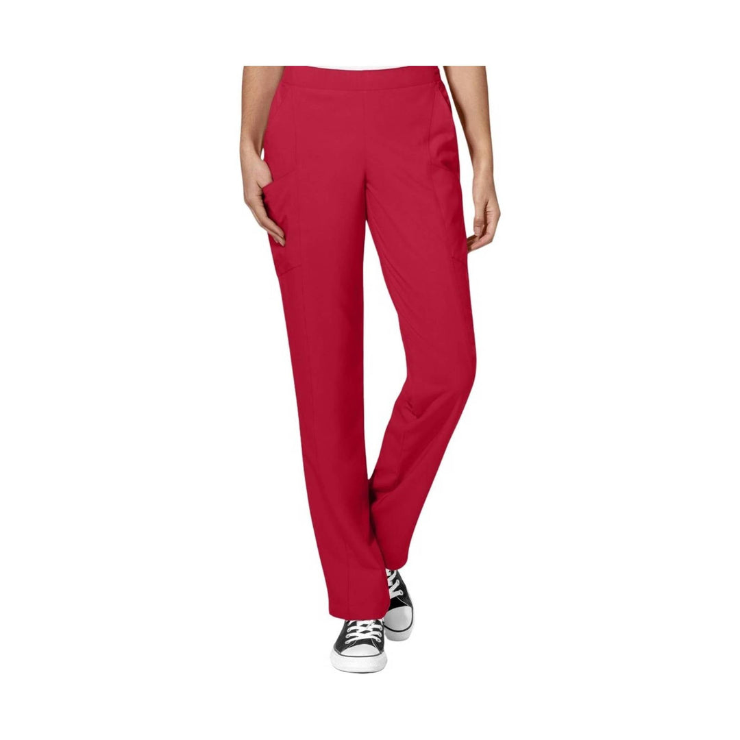Red straight-leg cargo scrub pants worn with black-and-white sneakers, front view