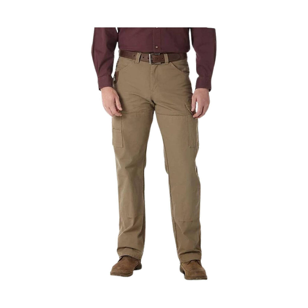 Tan cargo pants with side pockets, worn with a brown belt and brown shoes