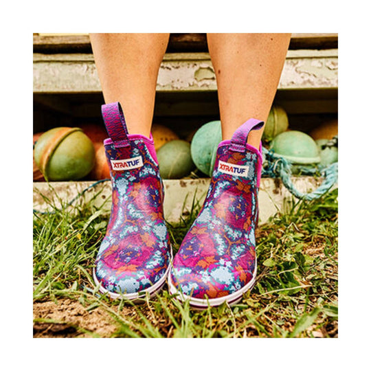 Colorful patterned ankle deck boots with pull tabs and XTRATUF labels