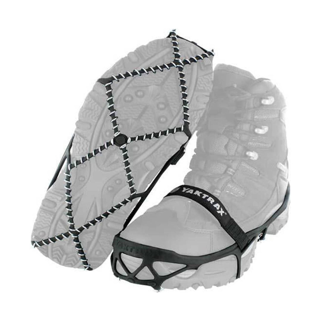 Black and silver shoe traction cleats with coiled metal spikes and elastic straps, shown from the sole and side