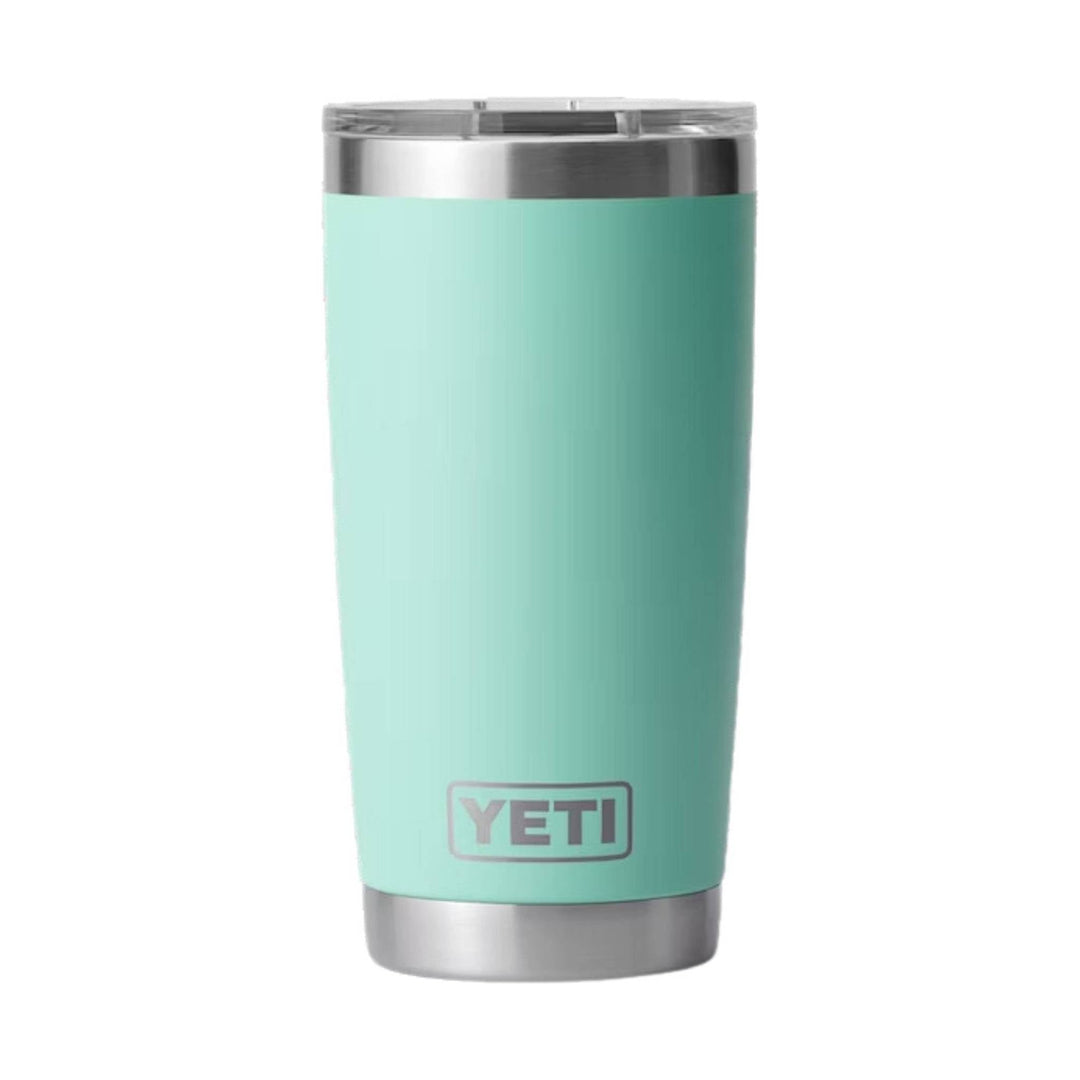 Mint green insulated tumbler with stainless steel top and bottom and YETI logo