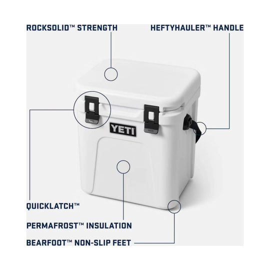 White hard cooler with black latches and side handle, shown with feature callouts