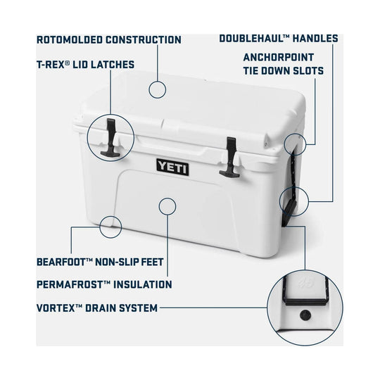 White hard cooler with black latches and handles, labeled with features like rotomolded construction and vortex drain system
