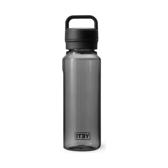 Translucent gray water bottle with black carry handle and screw-on cap